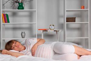 Ilustración de Cómo dormir mejor durante el embarazo